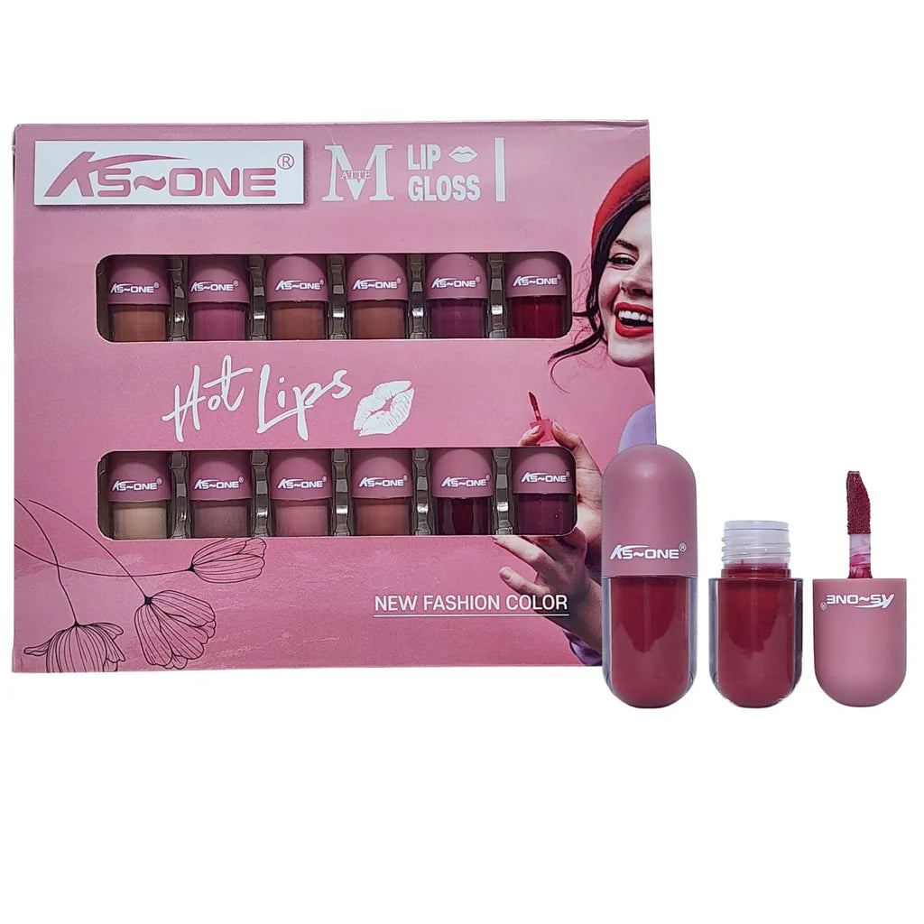 kS ONE lip gloss set with packaging on a white background