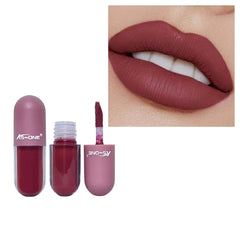Lipstick with applicator and close-up of lips wearing the color on a white background