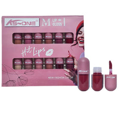 kS ONE lip gloss set with packaging on a white background